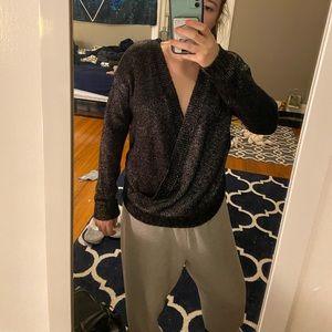 Black and grey cross body sweater